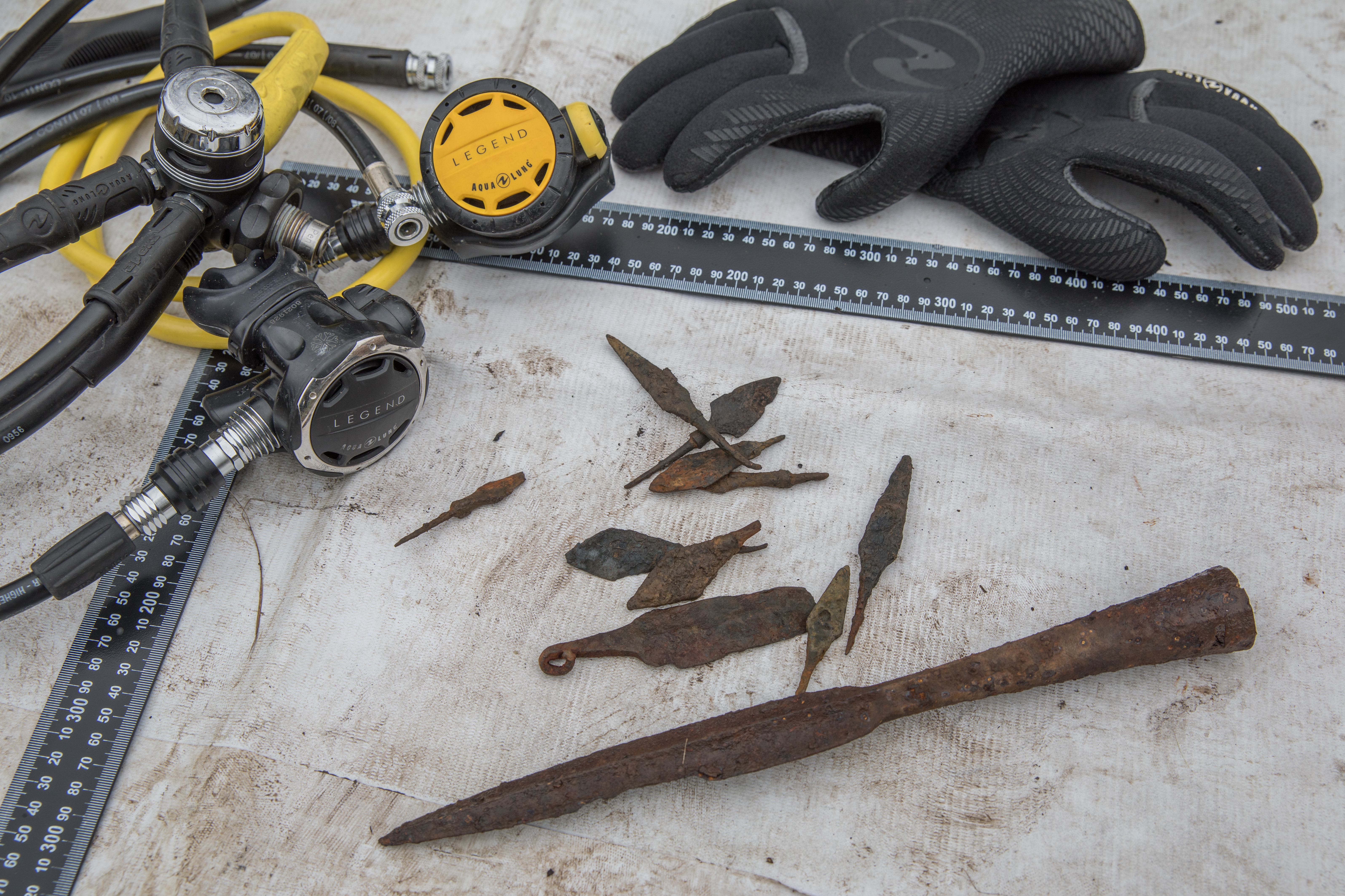 Medieval Russian spearhead, arrowheads and artifacts found on the river bottom. Photo by Stanislav Trofimov 